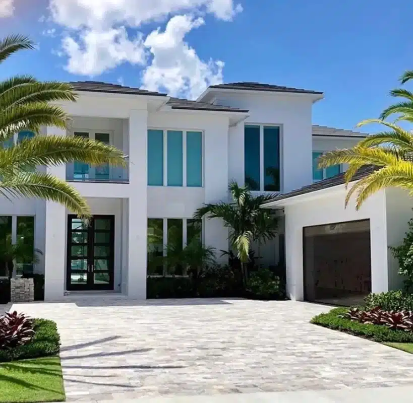 Modern two-storey white Florida home fitted with impact windows and doors